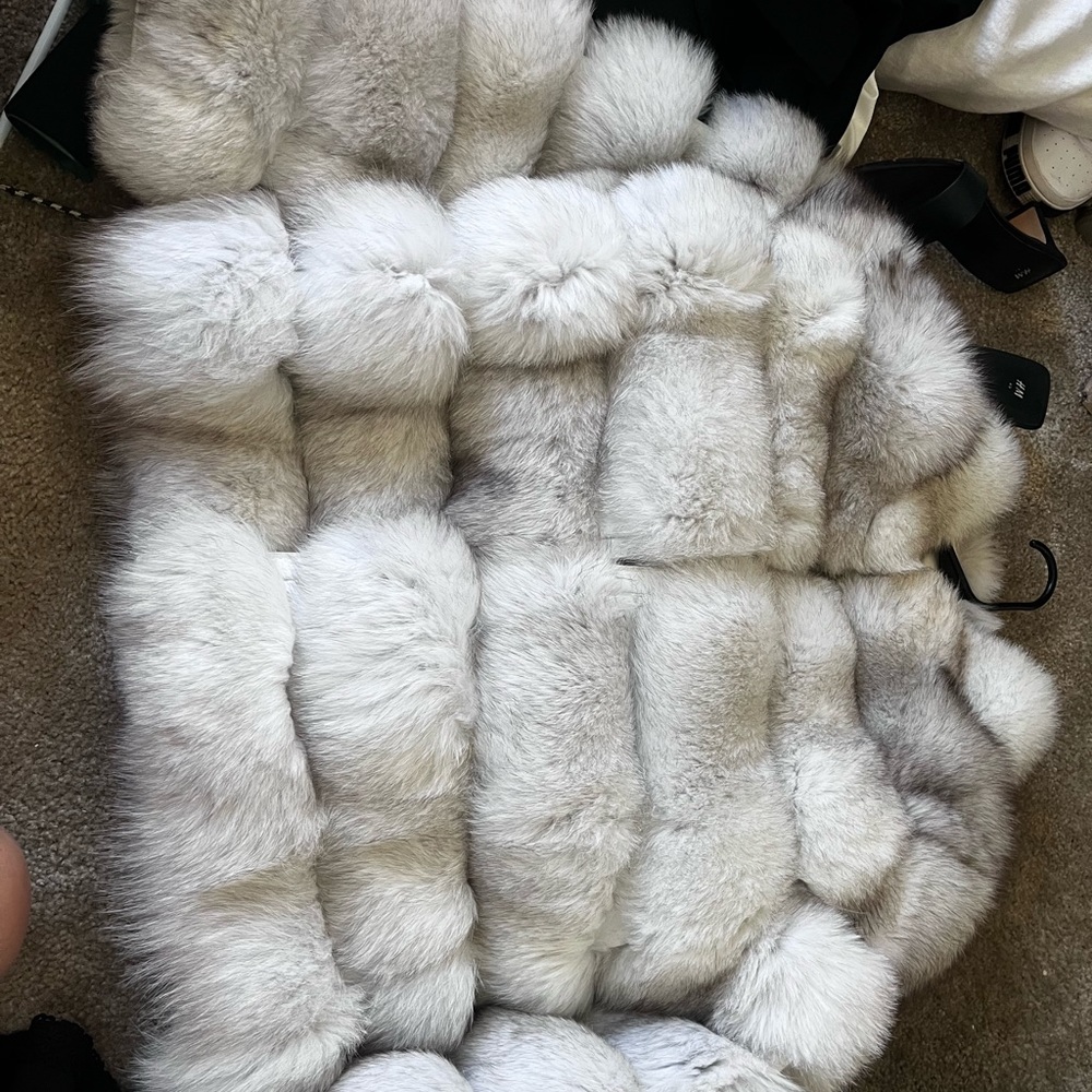 Fox fur coat - size medium. Arms unzip to wear as a vest to.